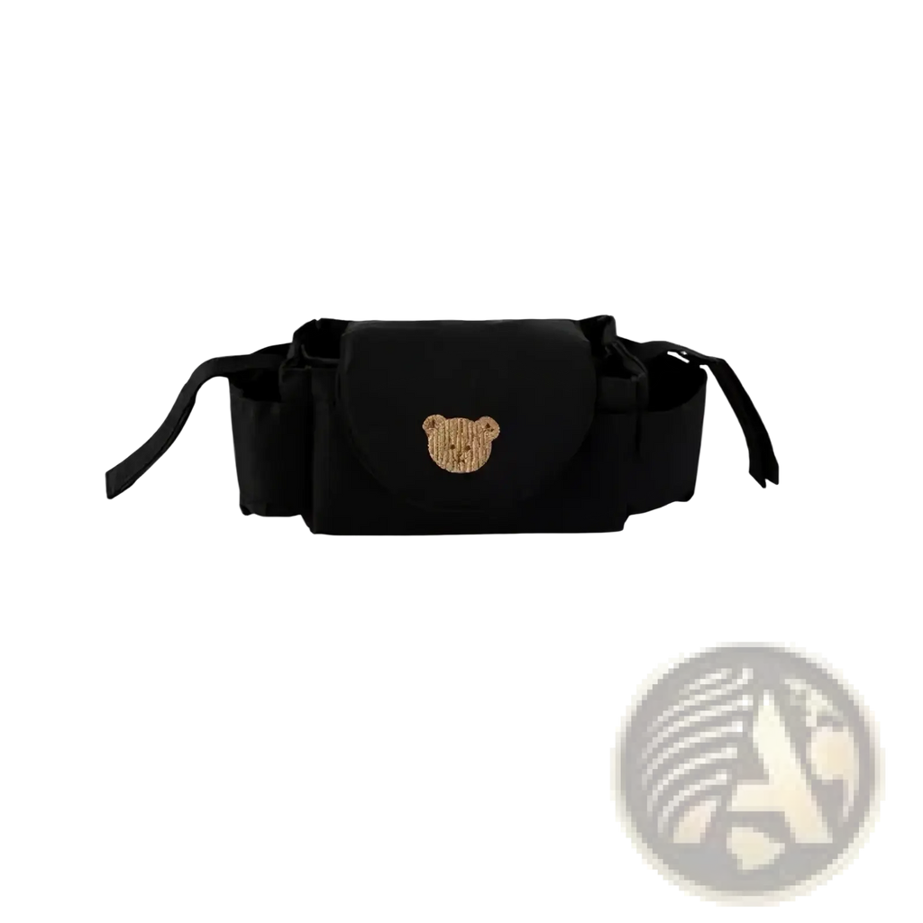Black fabric stroller organizer bag with gold sequined bear face emblem designed for convenient baby item storage