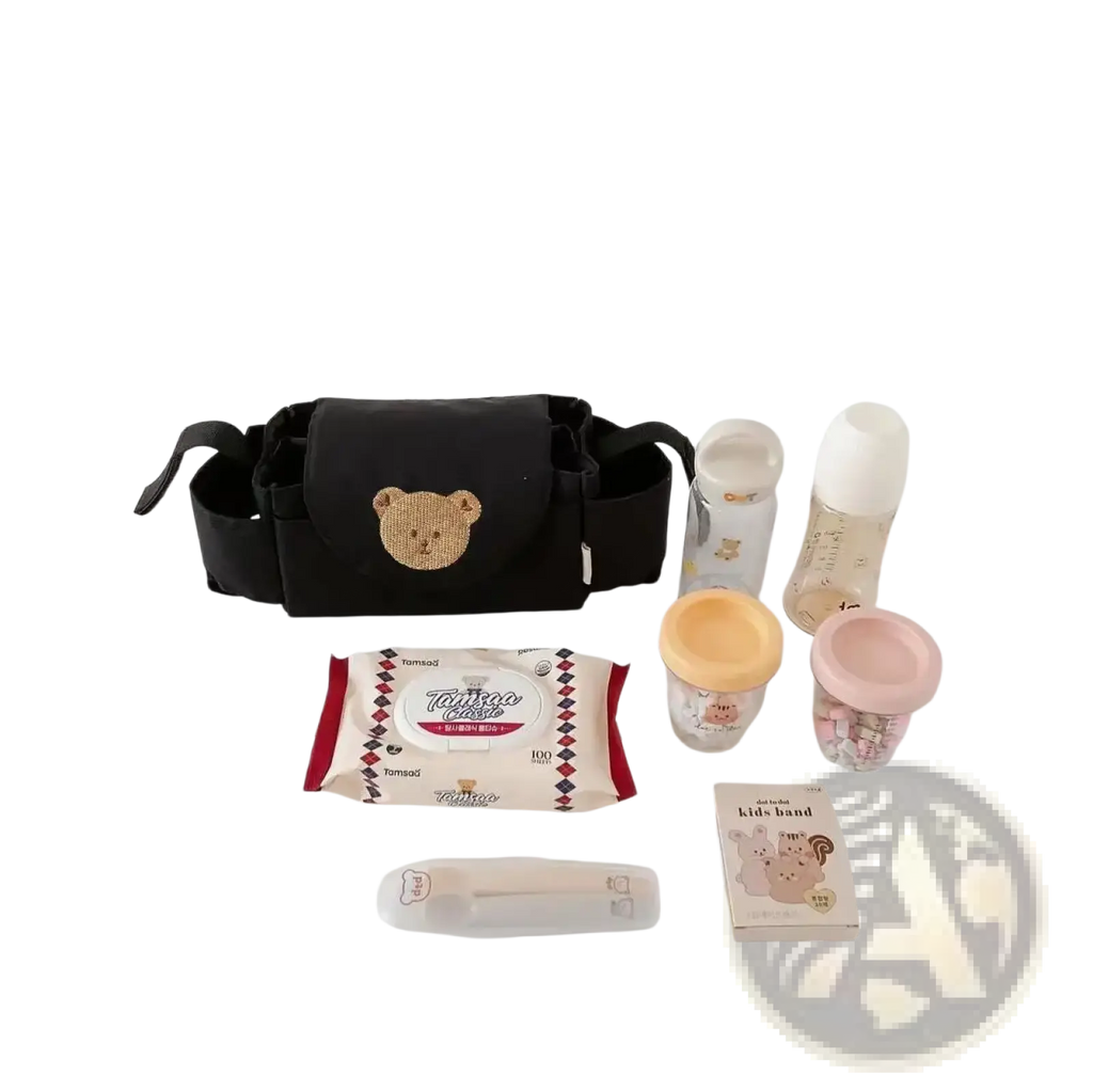 Black fabric stroller organizer bag featuring embroidered bear face detail for baby gear storage