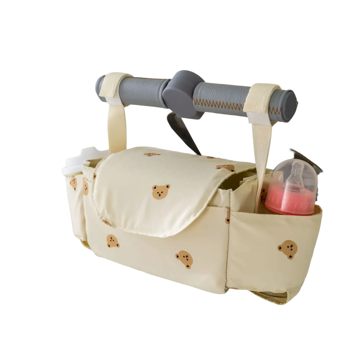 Cream-colored stroller organizer bag with embroidered brown bear faces and multiple compartments for baby essentials