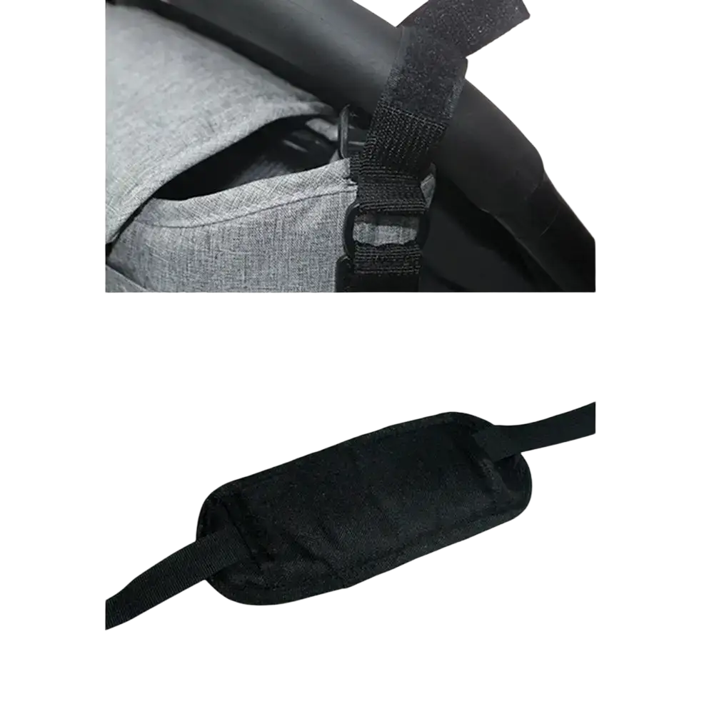 Black padded strap with adjustable velcro closure on the back of stroller organizer bag for universal pram storage caddy