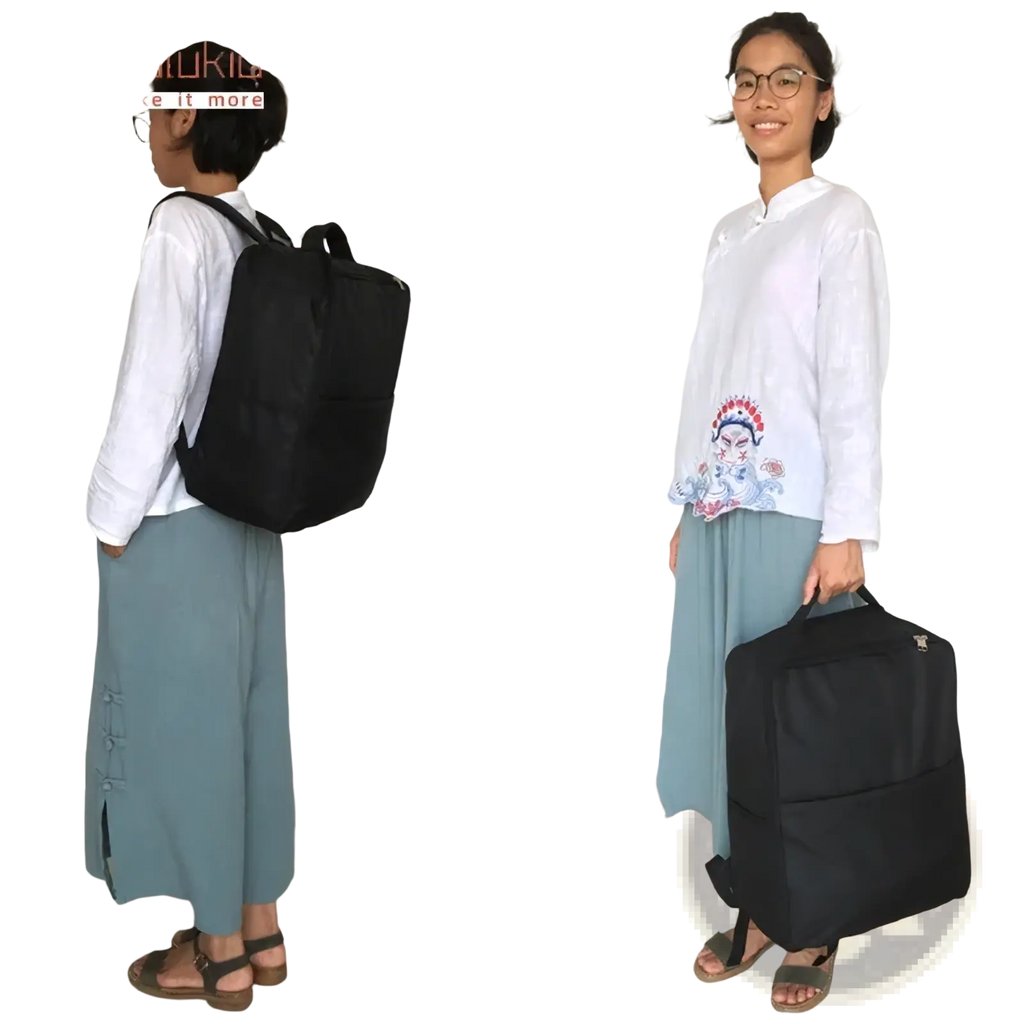 Black stroller travel backpack for Cybex Libelle Gb Pockit with adjustable straps and front pocket visible from back side