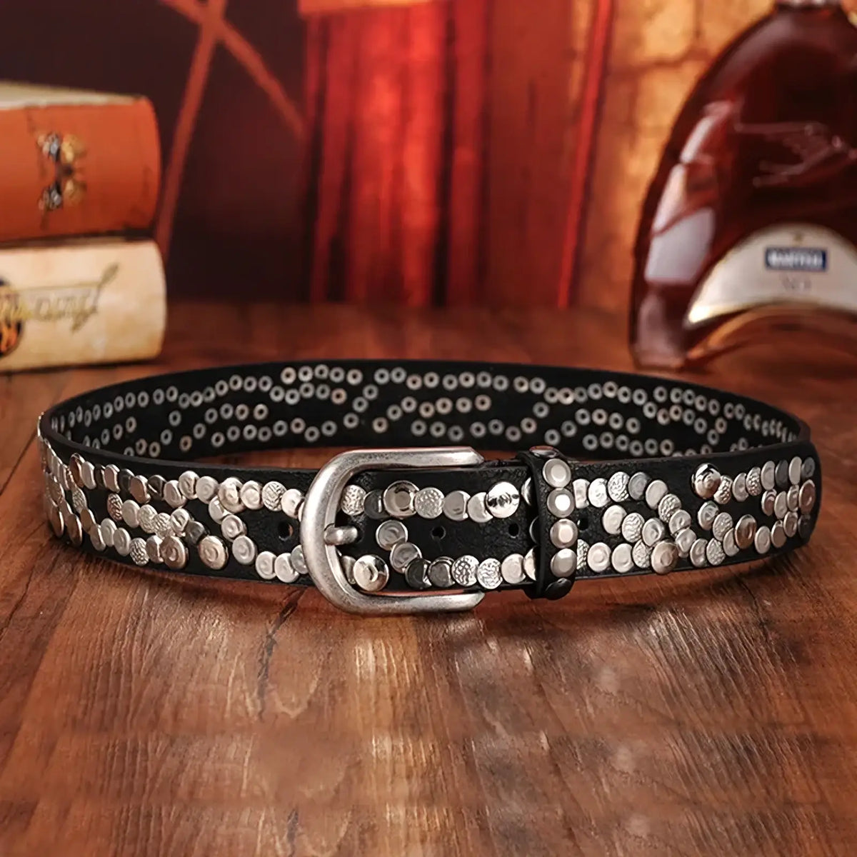 Black leather studded punk belt for women featuring silver-toned metallic studs and matching buckle