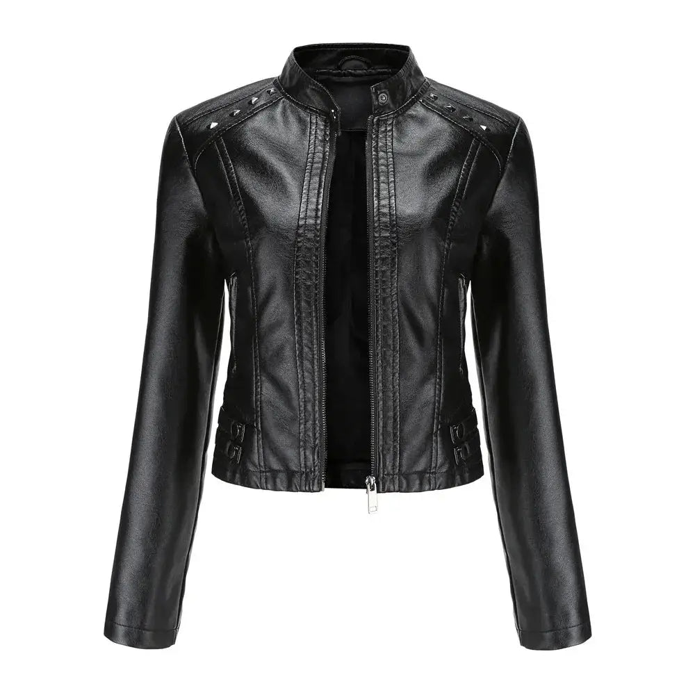 Black faux leather moto jacket with silver rivets featuring studs along the shoulders and a central zipper