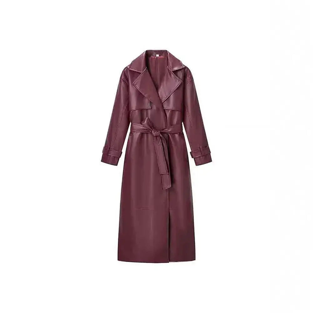 A sleek burgundy belted faux leather trench jacket with a classic waist belt and structured collar
