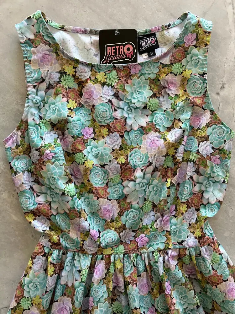 Vintage 1950s sleeveless cotton a-line dress with vibrant succulent print in mint green pink and yellow shades