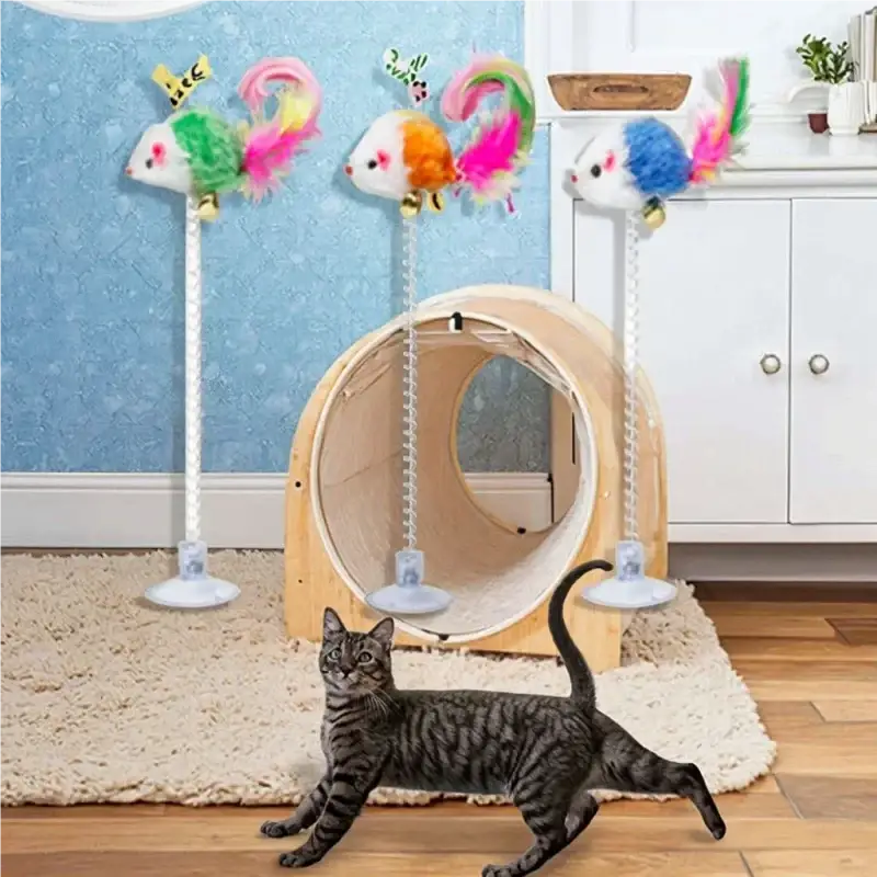 Three colorful feathered mouse toys with suction cup bases and long poles for interactive cat play