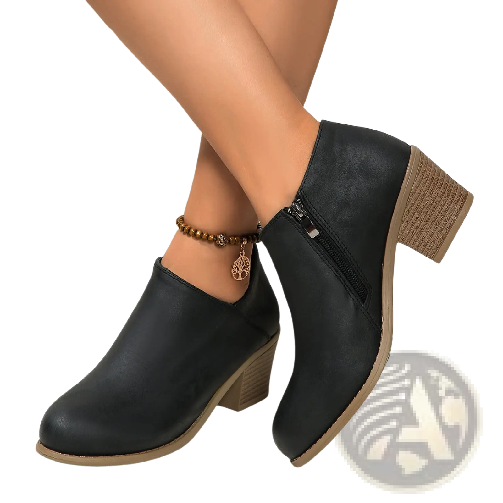 Black leather ankle boot with textured tan block heel and side zipper closure shown from the back side