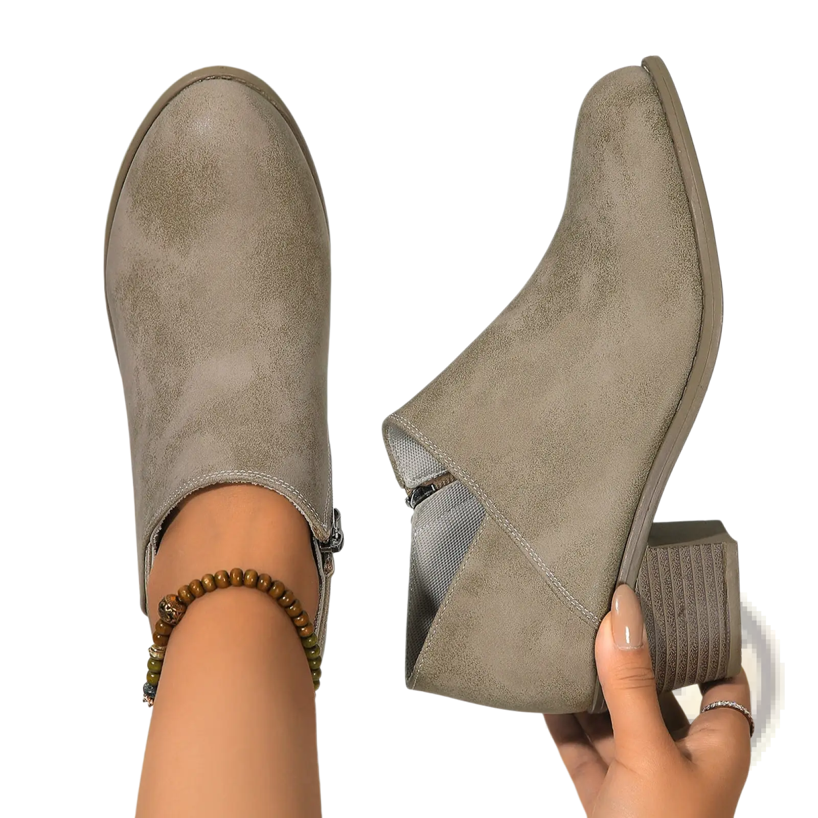 Gray suede ankle boot with chunky block heel and side zipper closure shown from the back side