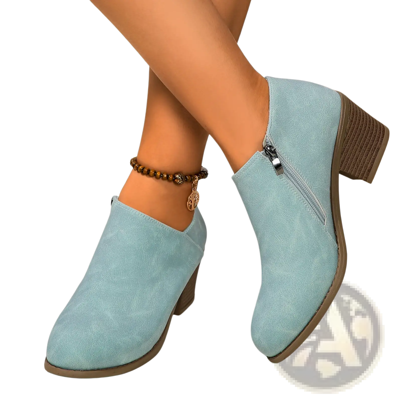 Light blue suede ankle boots with chunky brown heel and side zipper for stylish and comfortable wear