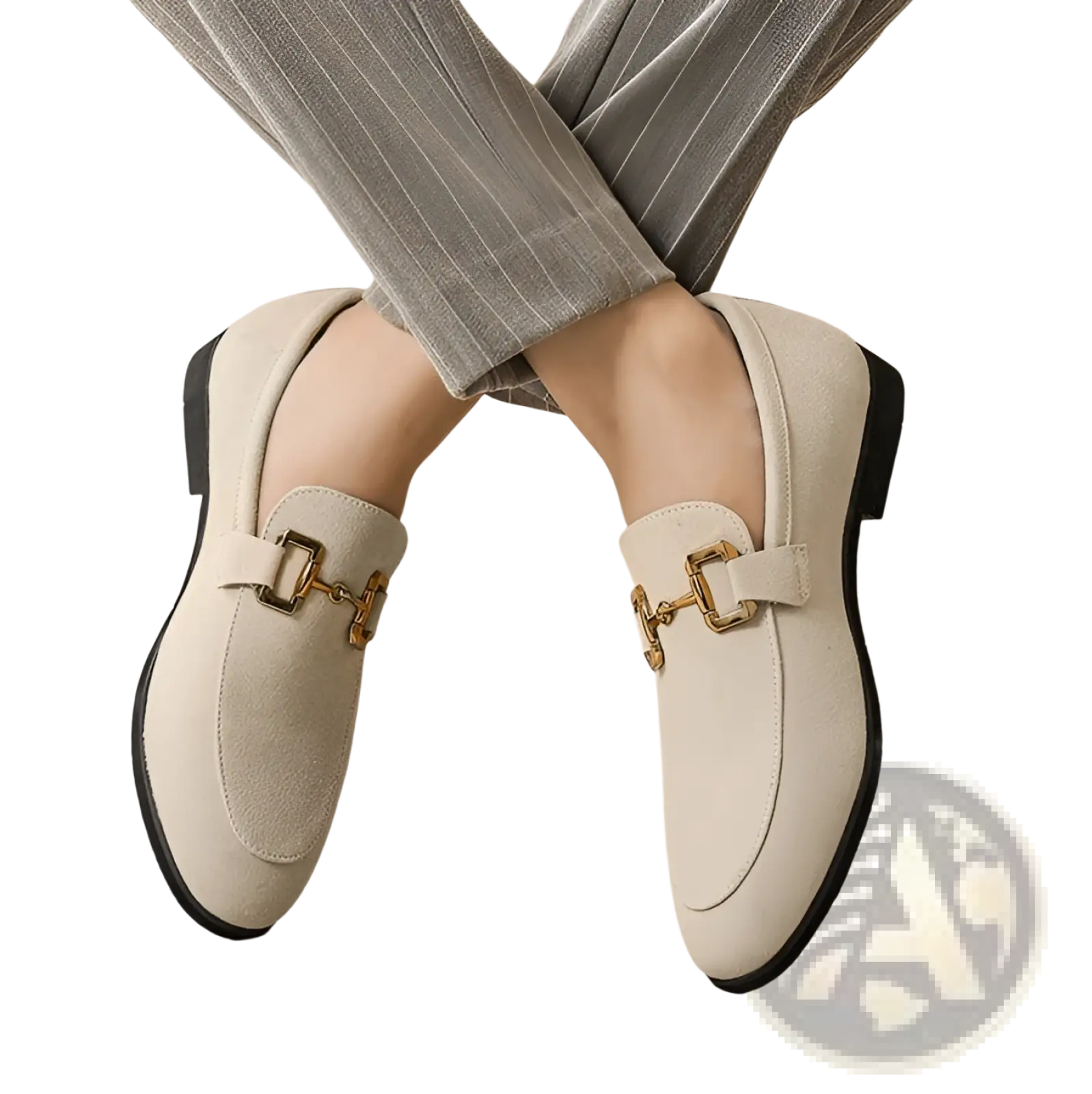 Beige suede loafers for men with gold tone horsebit buckles and black rubber soles in khaki color