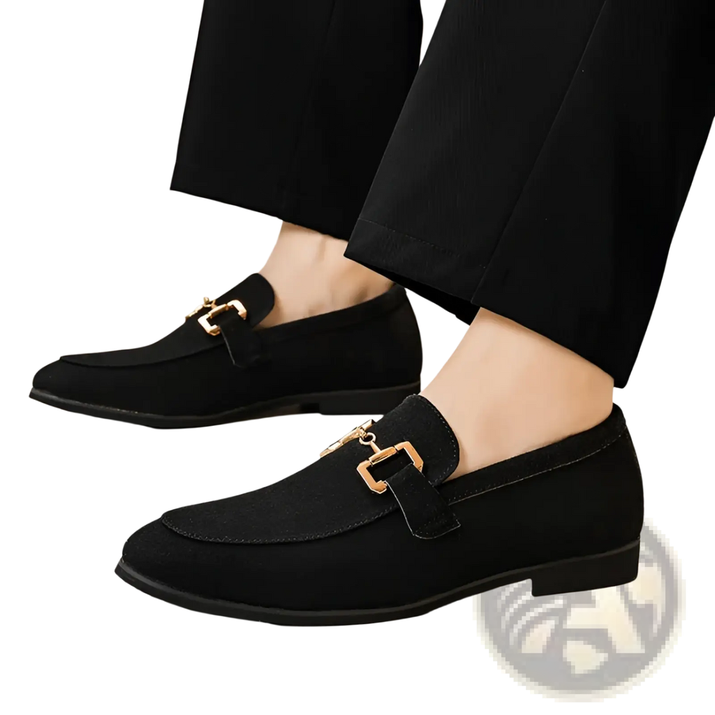 Black suede loafers for men featuring gold-tone buckle accents in a classic formal style