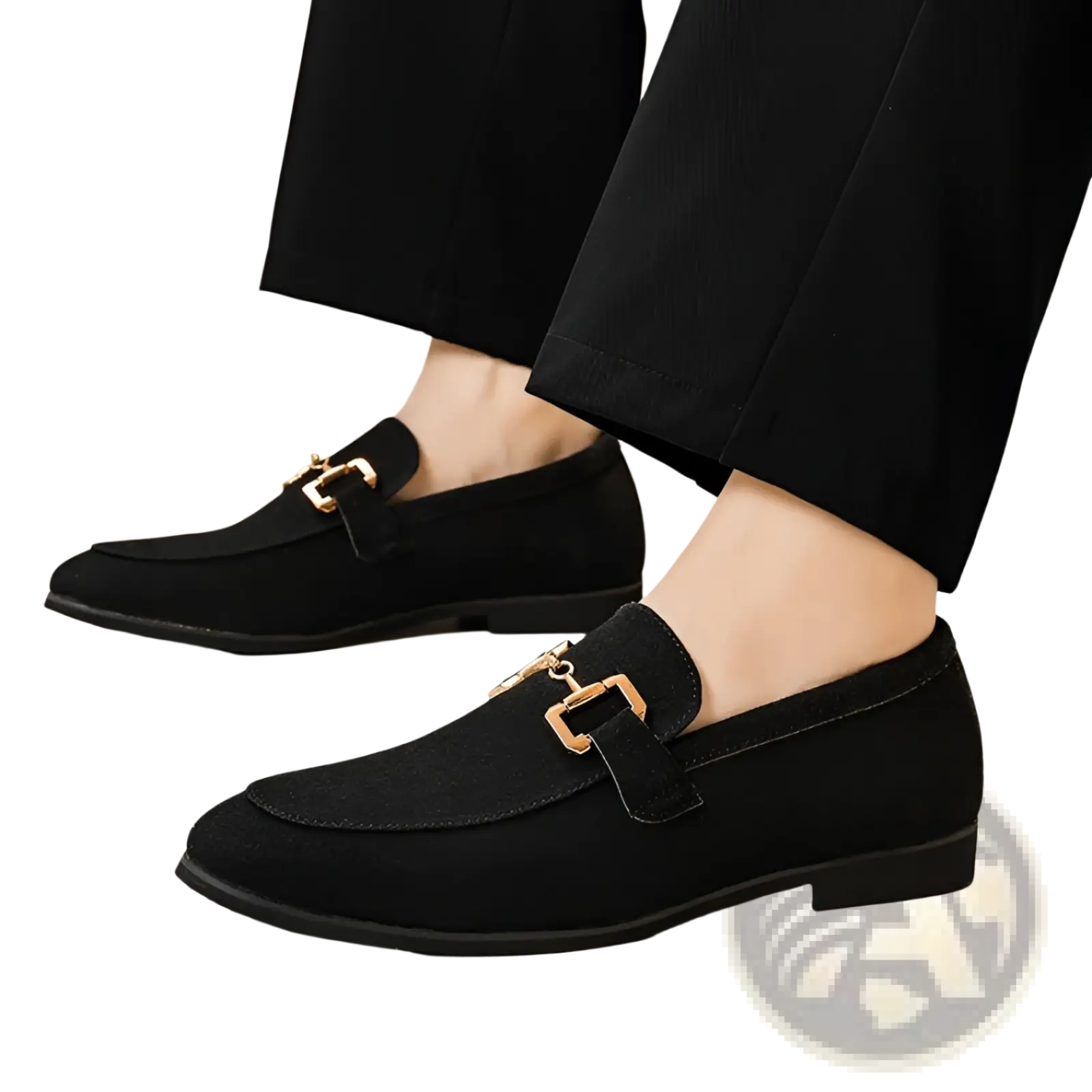 Black suede loafers for men featuring gold-tone buckle accents in a formal style