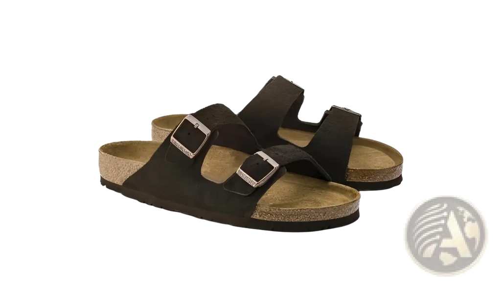 Mocha-colored suede cork footbed sandals with two silver-toned adjustable buckle straps for comfort and style