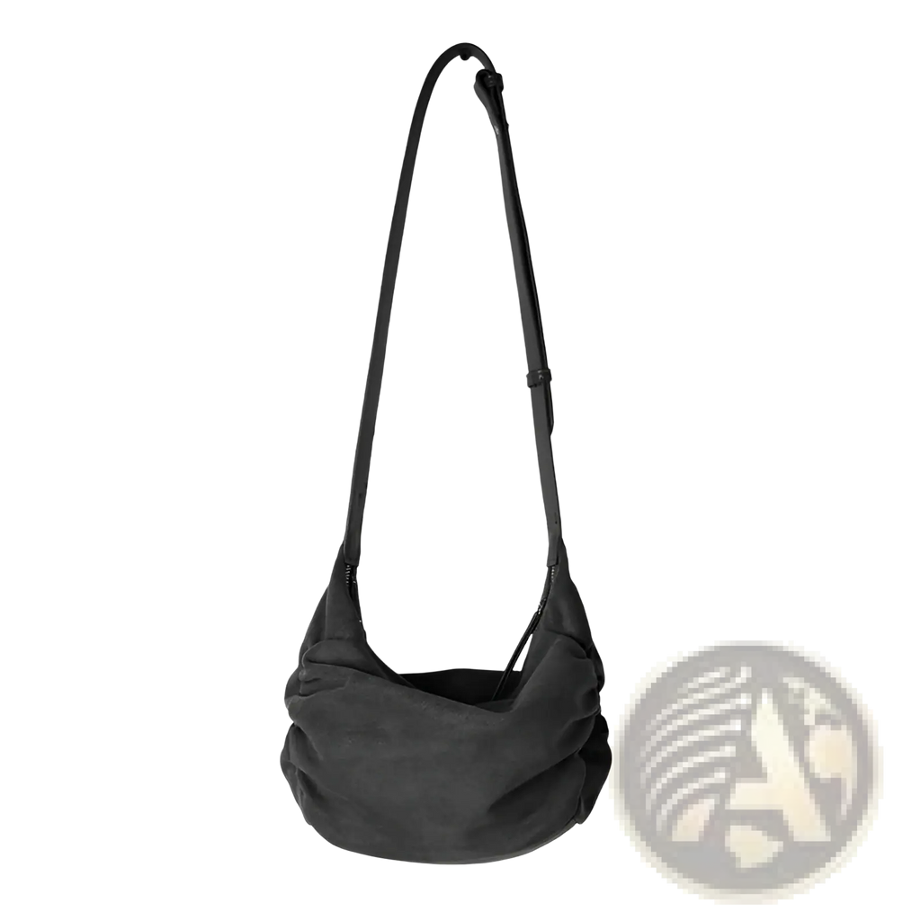 Black suede dumpling shoulder bag with long adjustable strap slouchy crossbody hobo style for everyday use