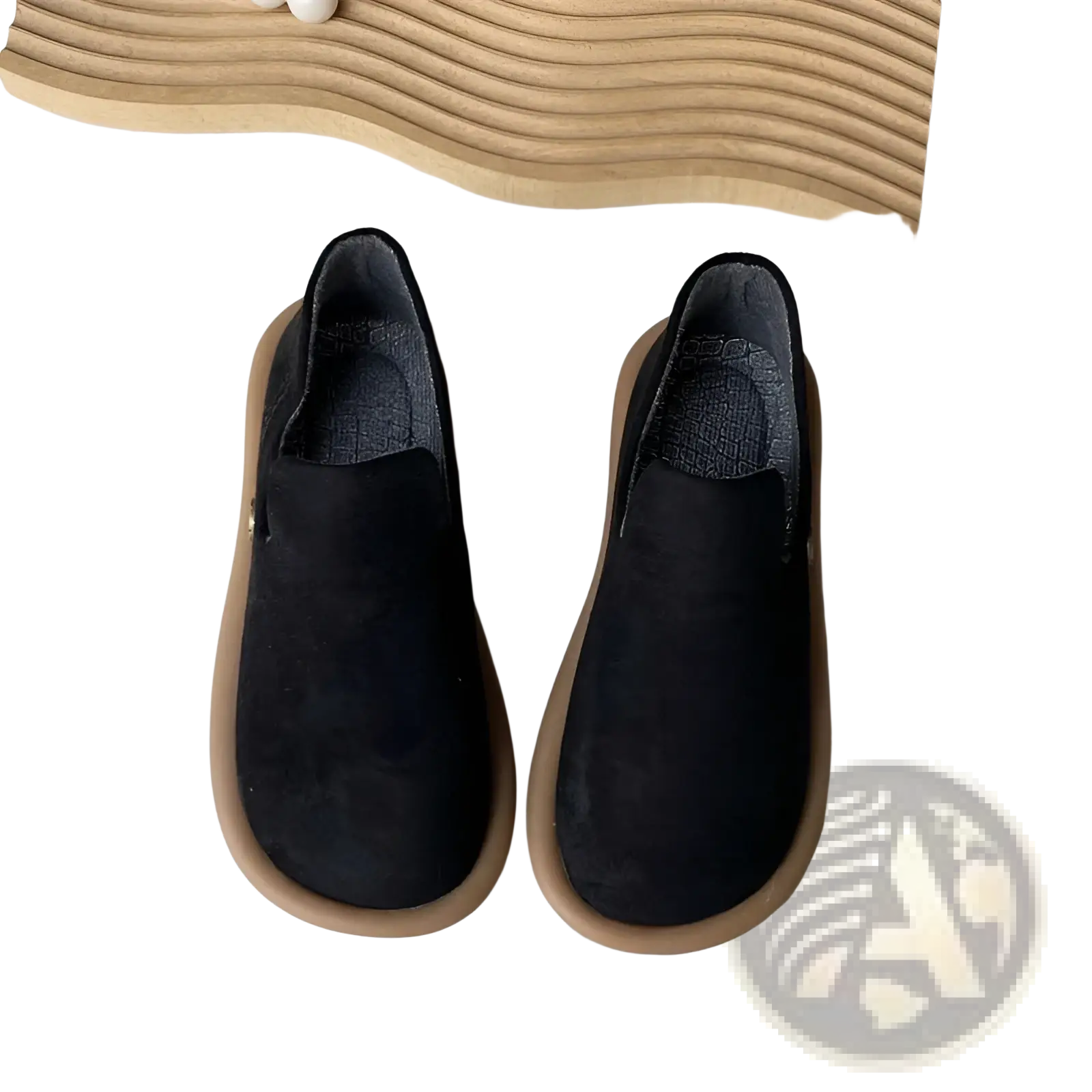 Black suede slip-on vintage British style low heel pumps with tan rubber sole for comfortable wear