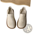 Cream-colored suede slip-on vintage British style low heel pumps with brown rubber sole for casual wear