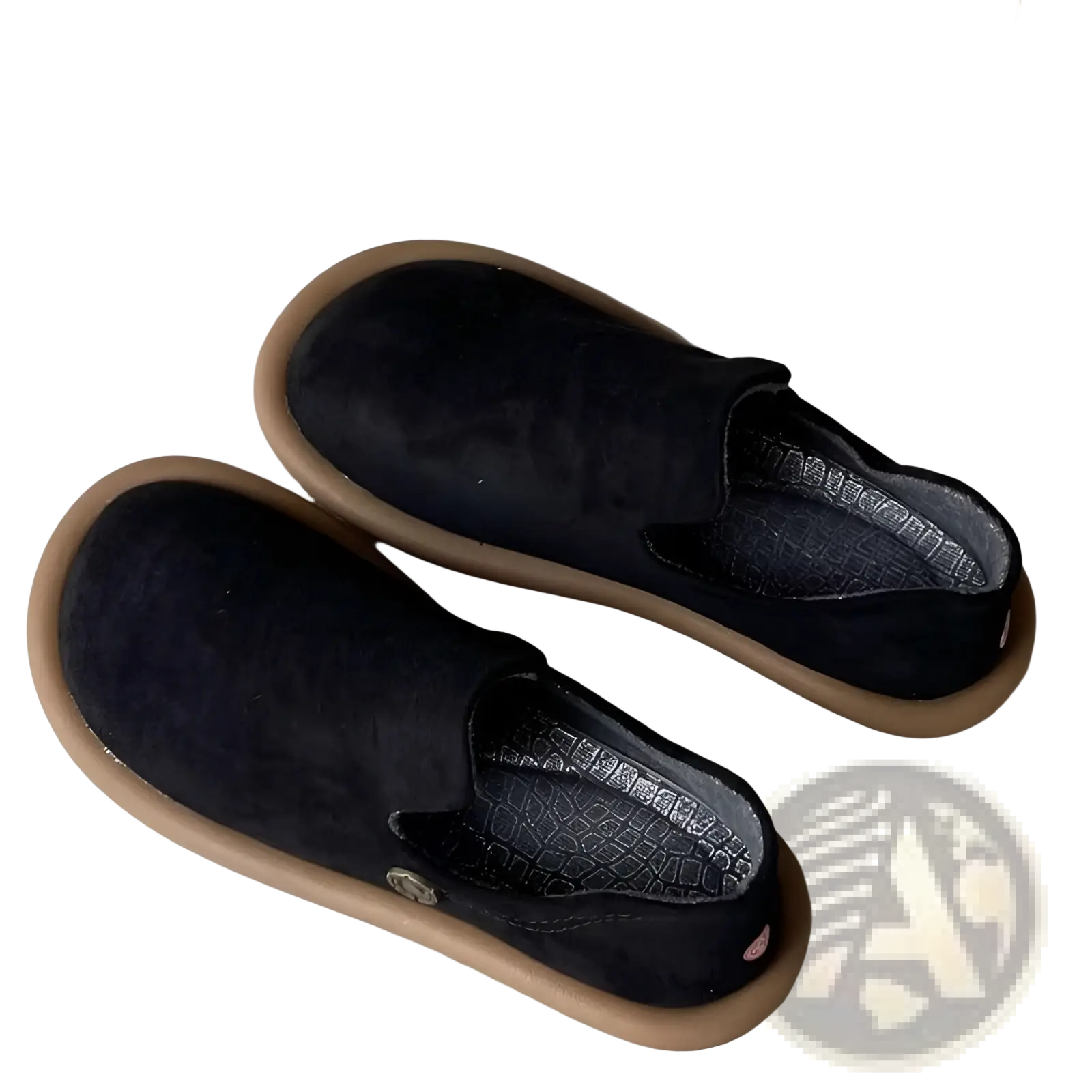 Black suede slip-on pumps with tan rubber sole and subtle branding detail in vintage british style low heel design