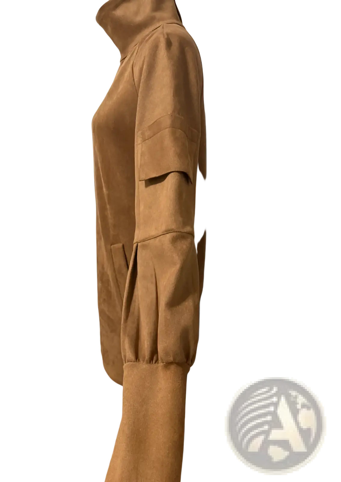 A tan suede turtleneck cargo mini dress with long sleeves featuring a high collar and patch pockets