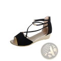 Black suede wedge sandals with crisscross straps and gold-tone metal accents for Korean low heel strappy shoes