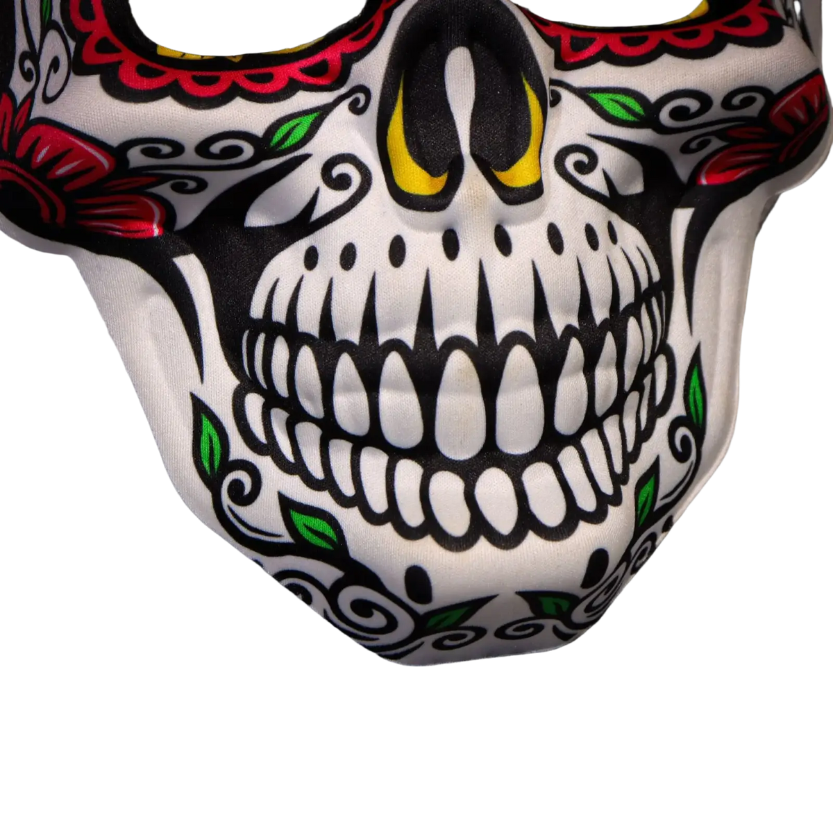 A white fabric sugar skull mask with vibrant red black and green floral patterns and yellow eye accents for Day of the Dead