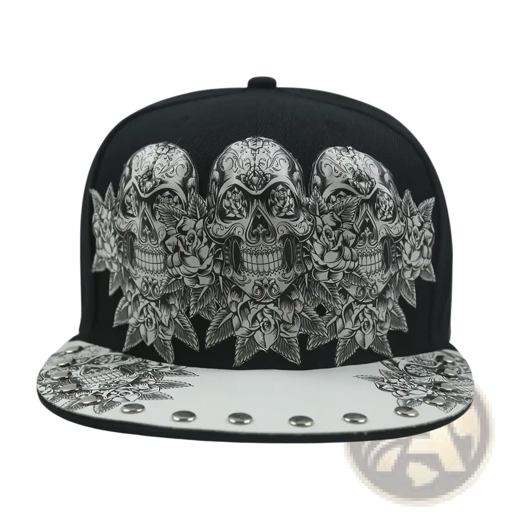 Black snapback baseball cap with detailed silver sugar skull and rose design and studded white brim for stylish wear