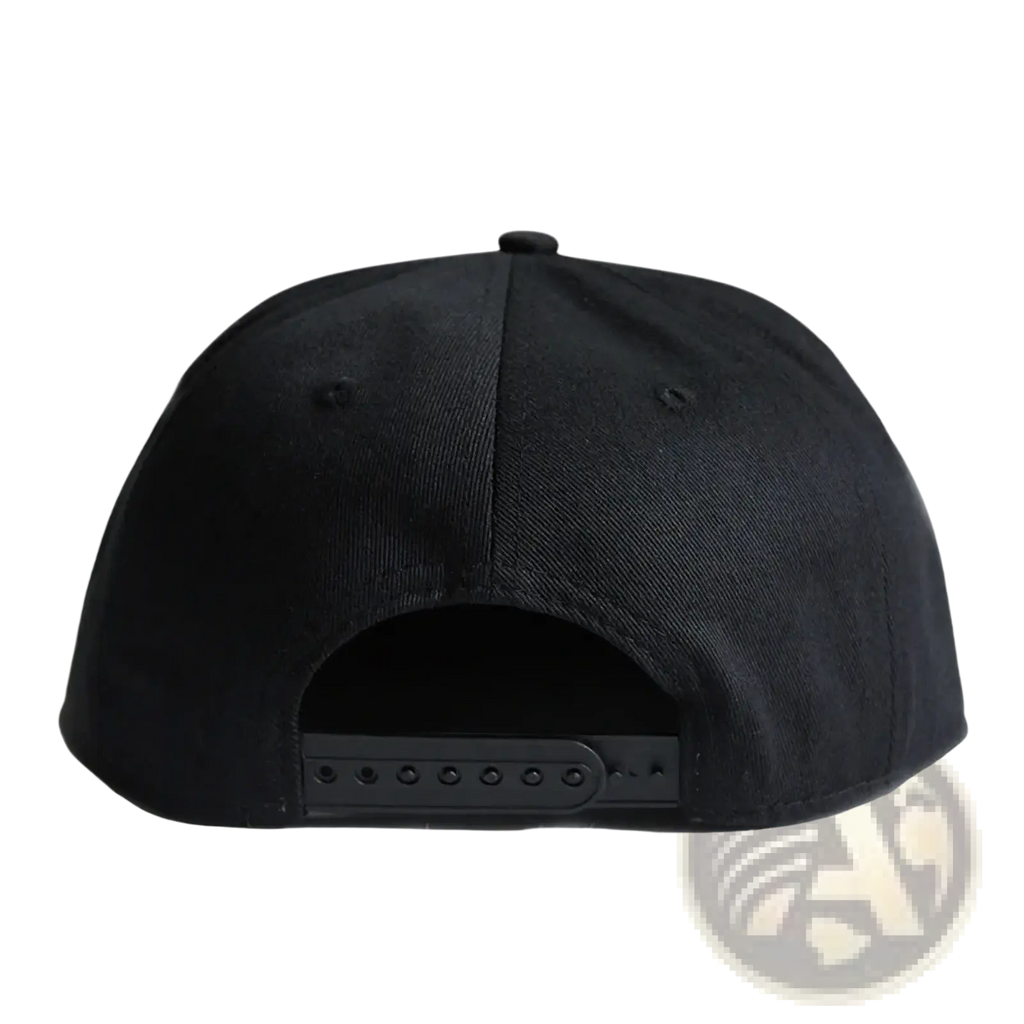 Black sugar skull rivet snapback baseball cap with structured crown and adjustable strap shown from the back side