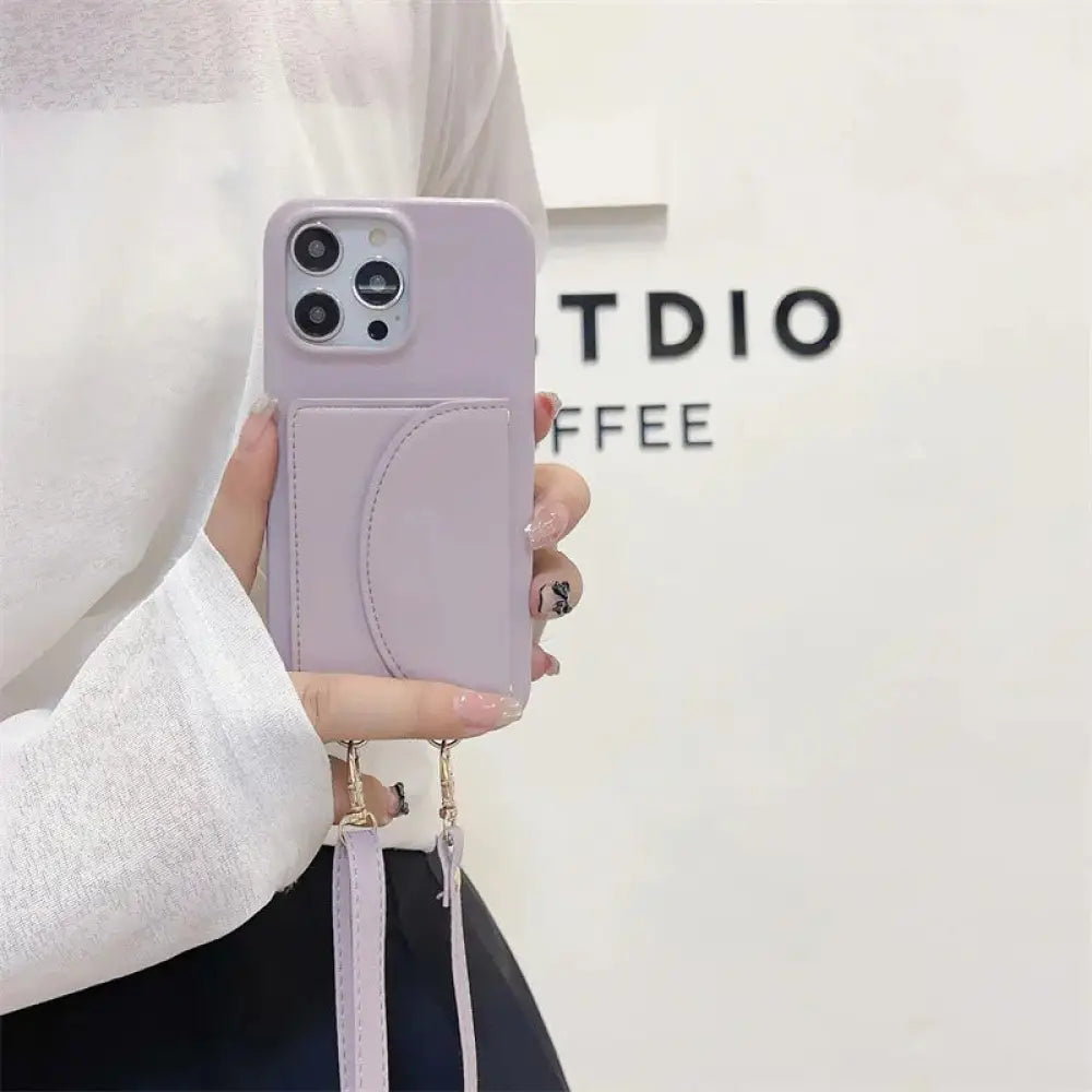 Lavender litchi leather phone case with built-in card holder and matching lanyard shown from the back side