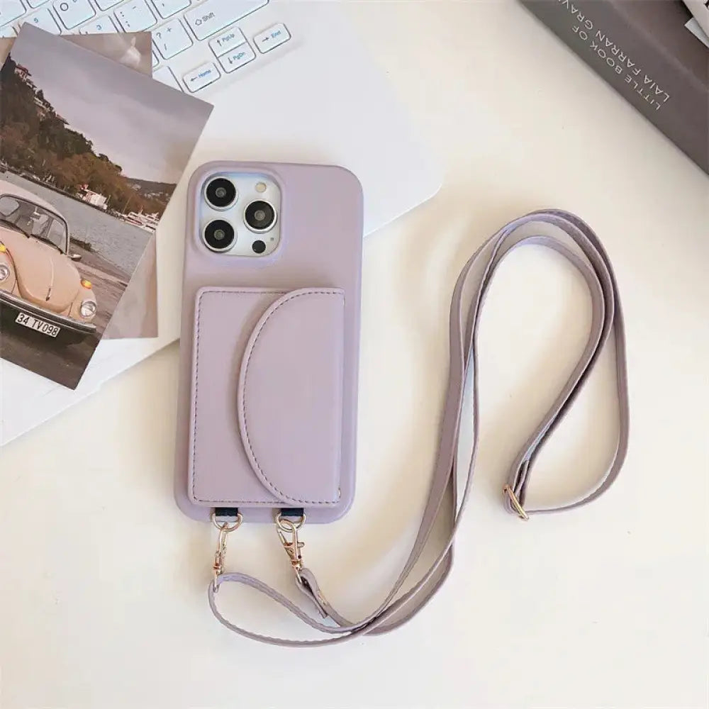 Lavender litchi leather card holder phone case with built-in card slot and matching adjustable lanyard strap back side view