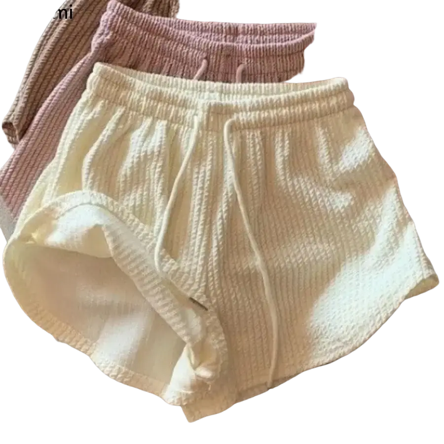 Cream-colored ribbed knit summer shorts with a drawstring waistband for waffle sport fitness and high waist support