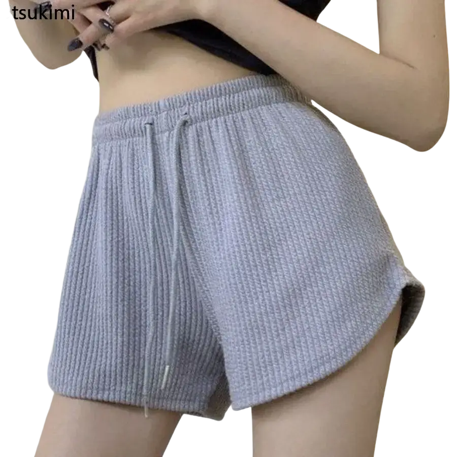 Light gray ribbed knit summer shorts with waffle sport fitness texture drawstring waistband and side slits