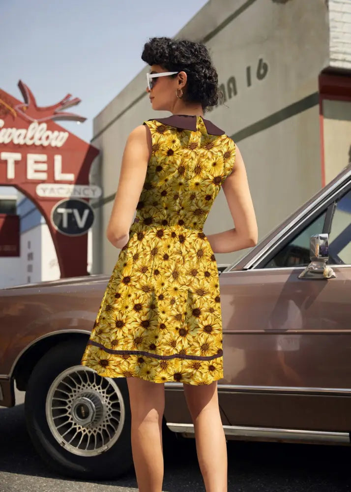 Retro sunflower cotton sleeveless dress in vibrant yellow with sunflower pattern dark brown collar and hemband