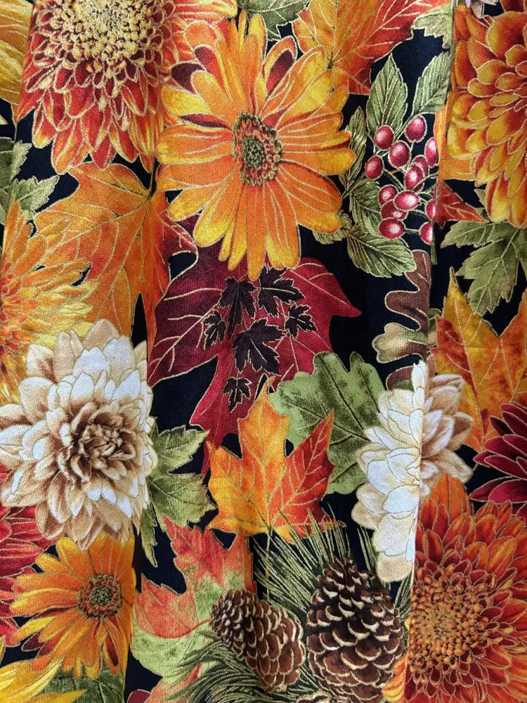 Vintage sunflower autumn floral cotton a-line dress with vibrant orange yellow red flowers maple leaves and pinecones on navy background