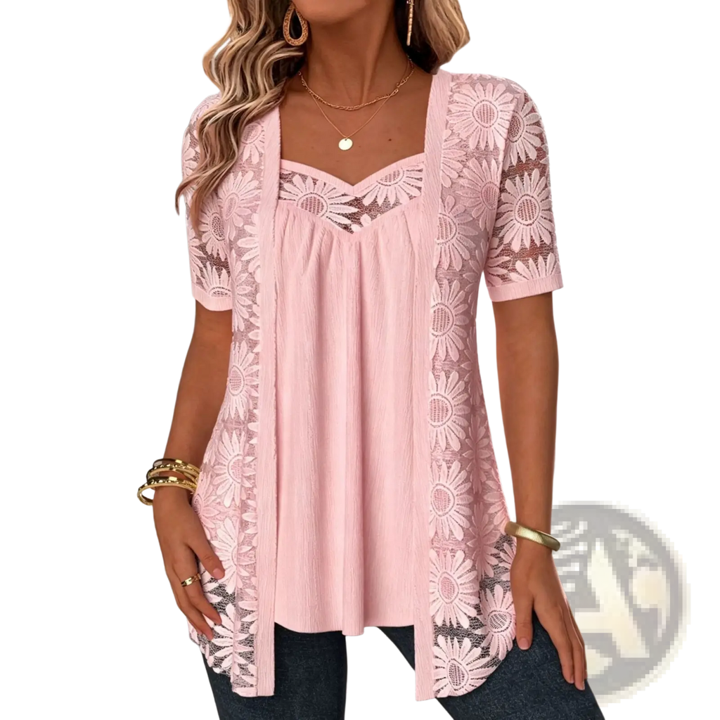 A soft pink sunflower lace two-piece top featuring short sleeves and a flattering v-neckline