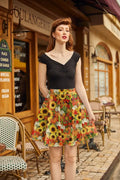 A vibrant sunflower and pumpkin autumn floral skater skirt with bold yellow, orange, and red leaf patterns