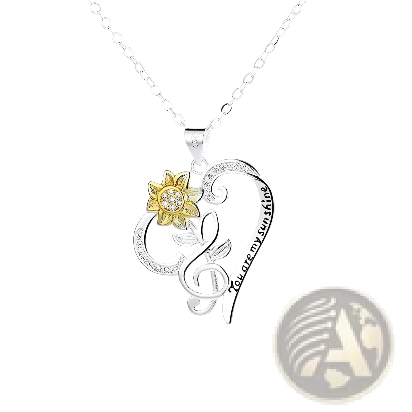 Silver and gold heart-shaped pendant necklace with sunflower charm engraved with you are my sunshine phrase