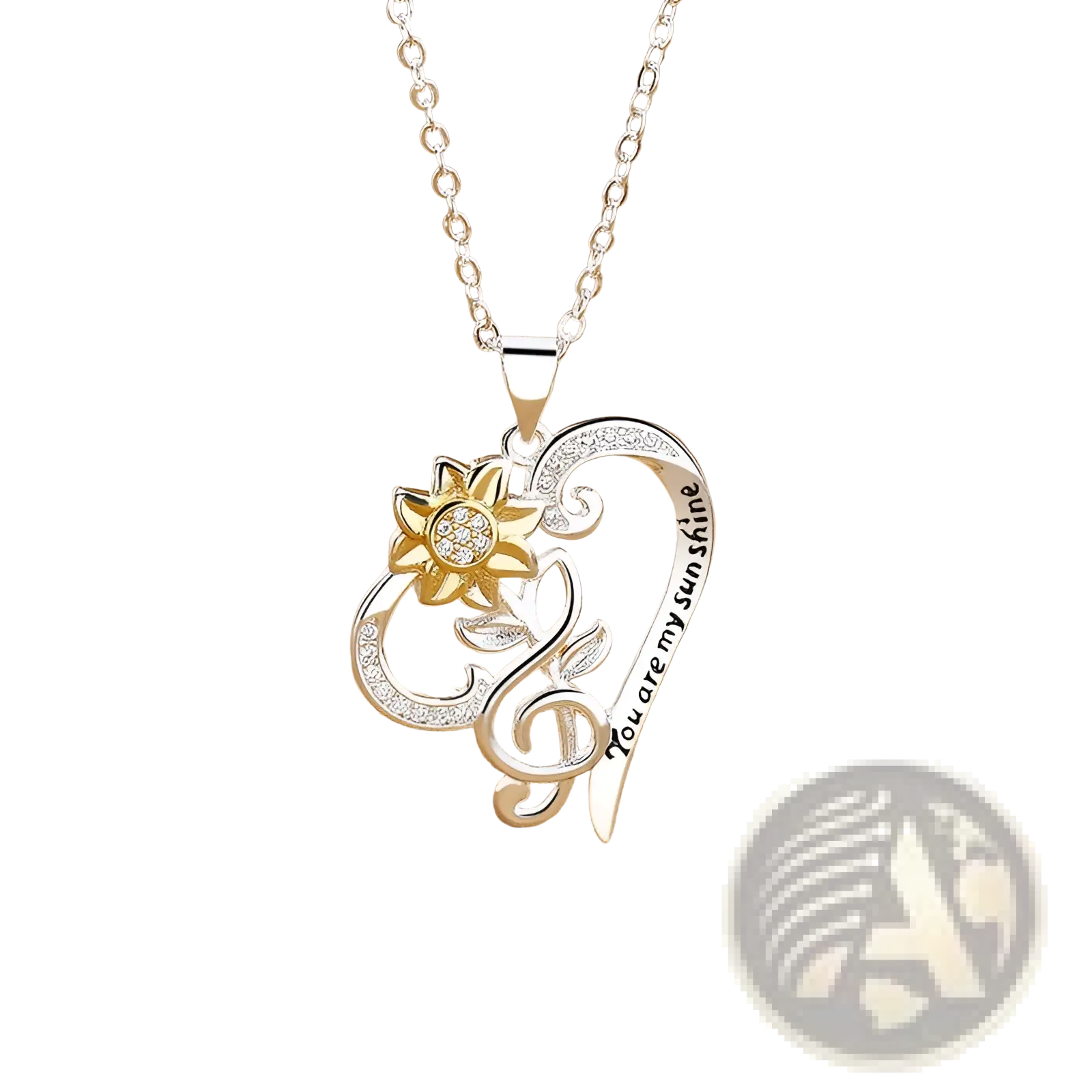 Silver heart-shaped pendant necklace with gold sunflower charm and crystals inscribed you are my sunshine