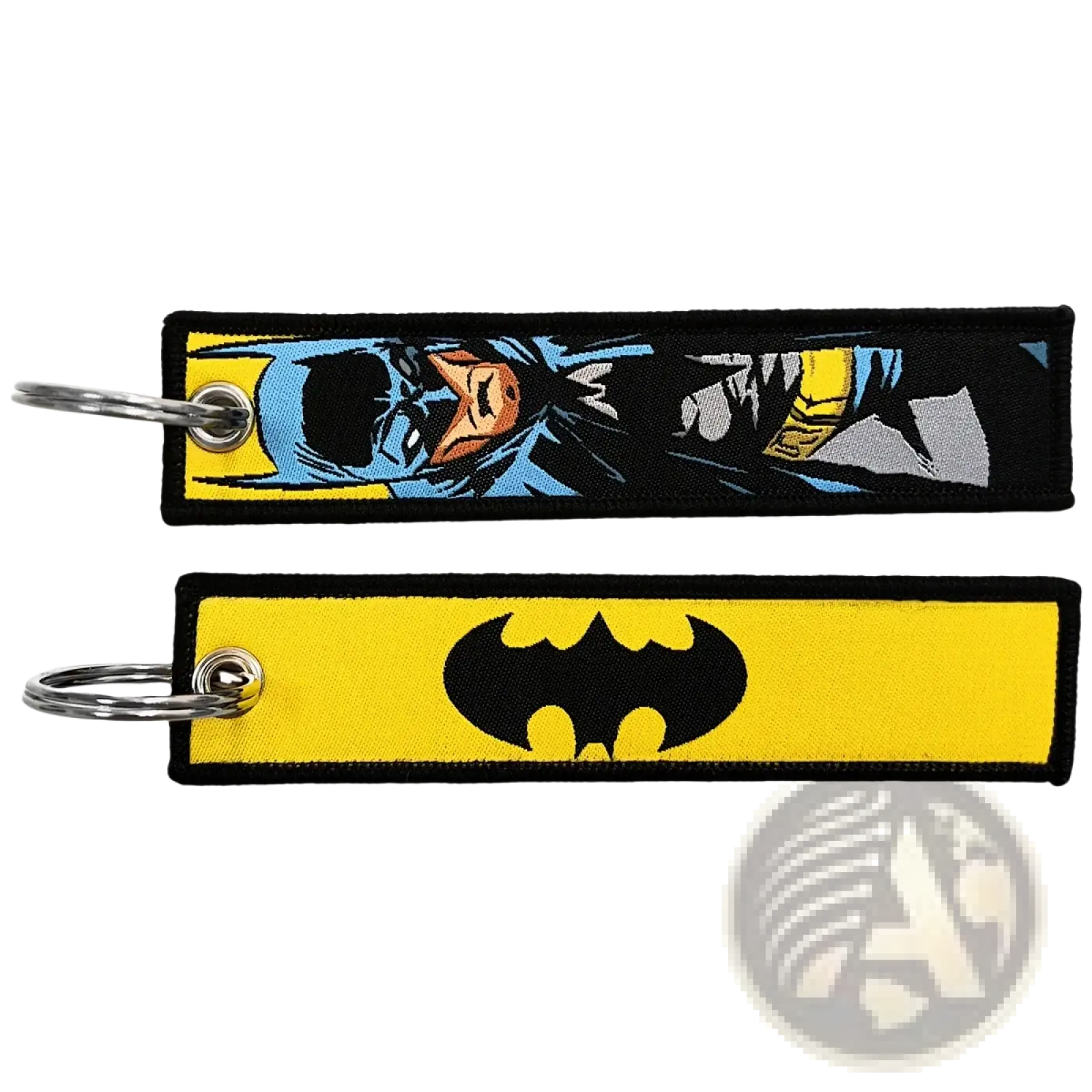 Two superhero embroidered keychains featuring a blue and yellow comic-style batman design and a black bat symbol on yellow fabric