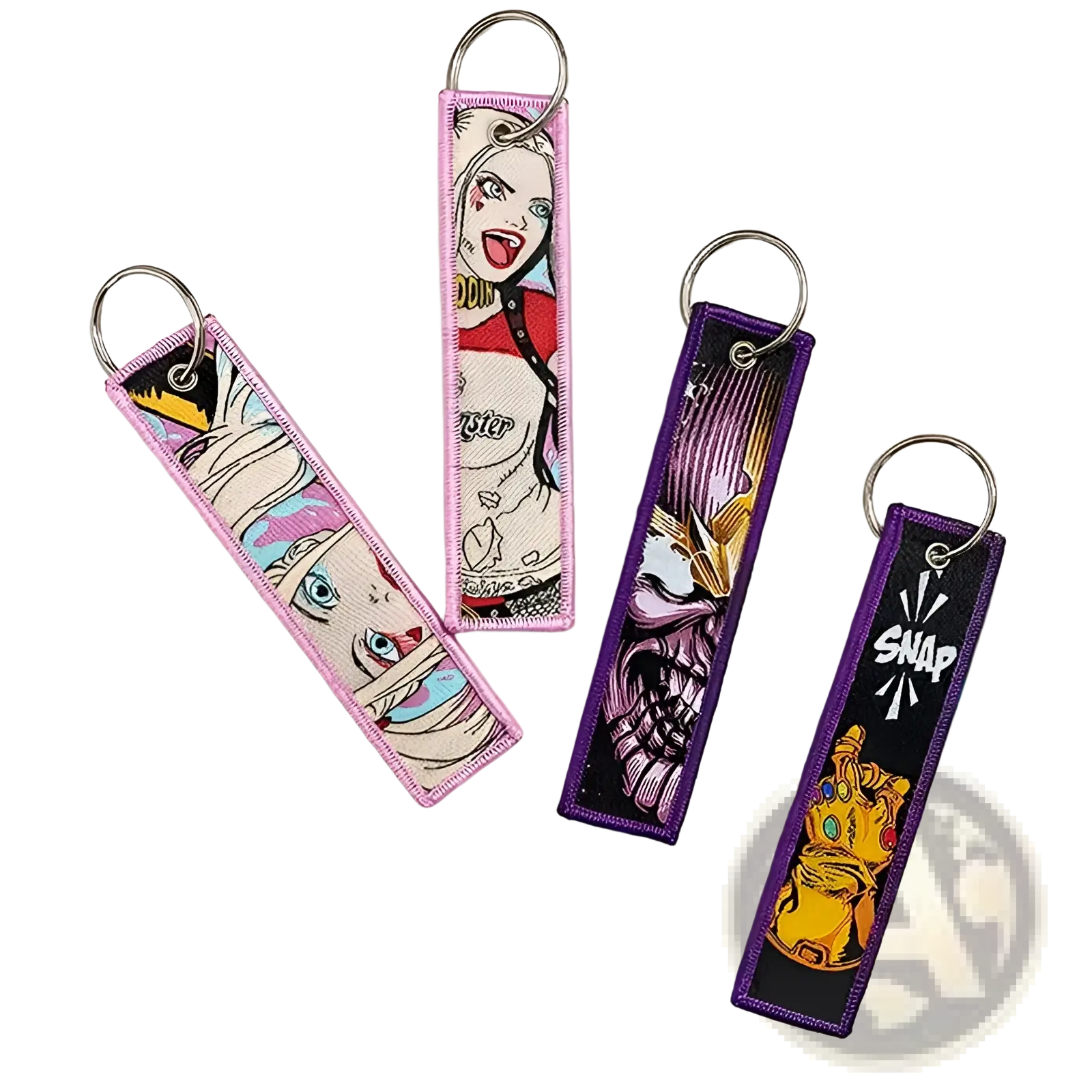 Pink and purple embroidered superhero keychain set featuring comic book character designs for anime key lanyards
