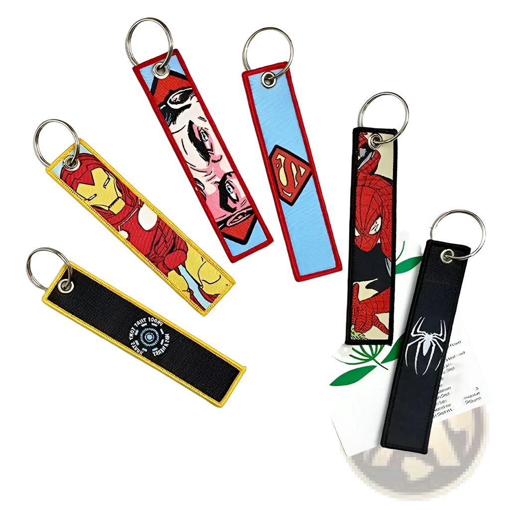 Superhero embroidered keychain set featuring iron man superman spider-man and avengers logo on fabric with metallic rings
