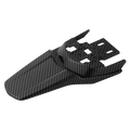Black carbon fiber surron motorcycle rear fender with sleek textured weave and angular mounting cutouts back view
