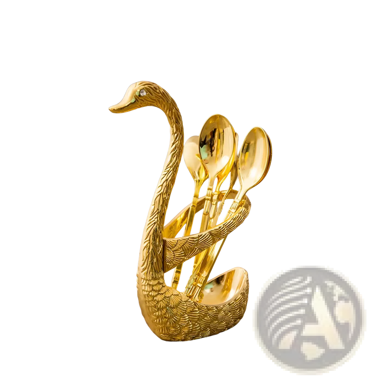 Golden swan-shaped spoon holder with textured feathers and gemstone holding four matching dessert spoons in gold
