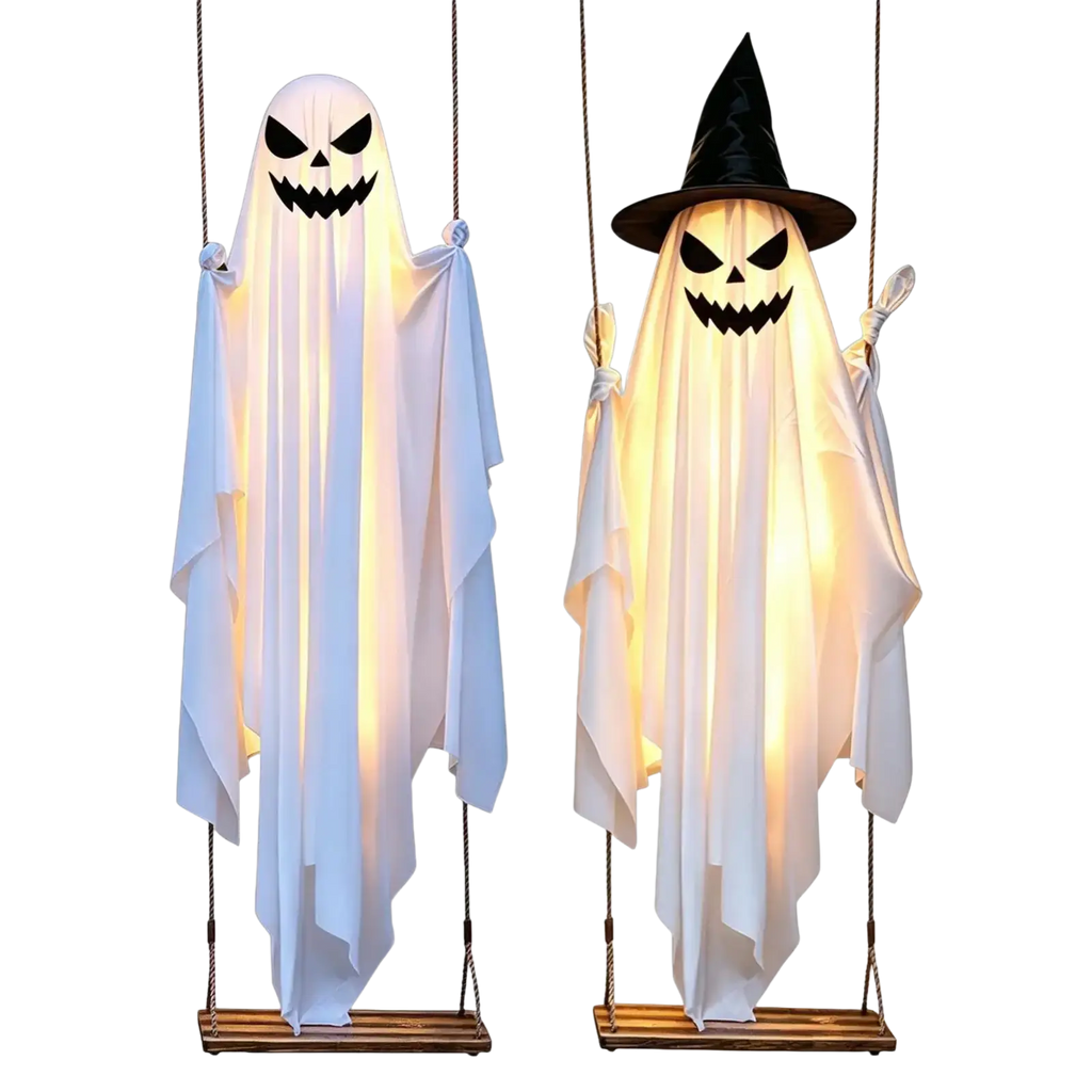 Two illuminated swinging ghost halloween tree swing decorations with white and black sheet designs hanging from wooden swings