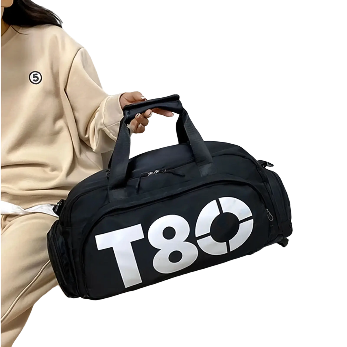 Black t80 gym duffel bag with shoe compartment featuring bold white lettering and dual top handles for easy carrying