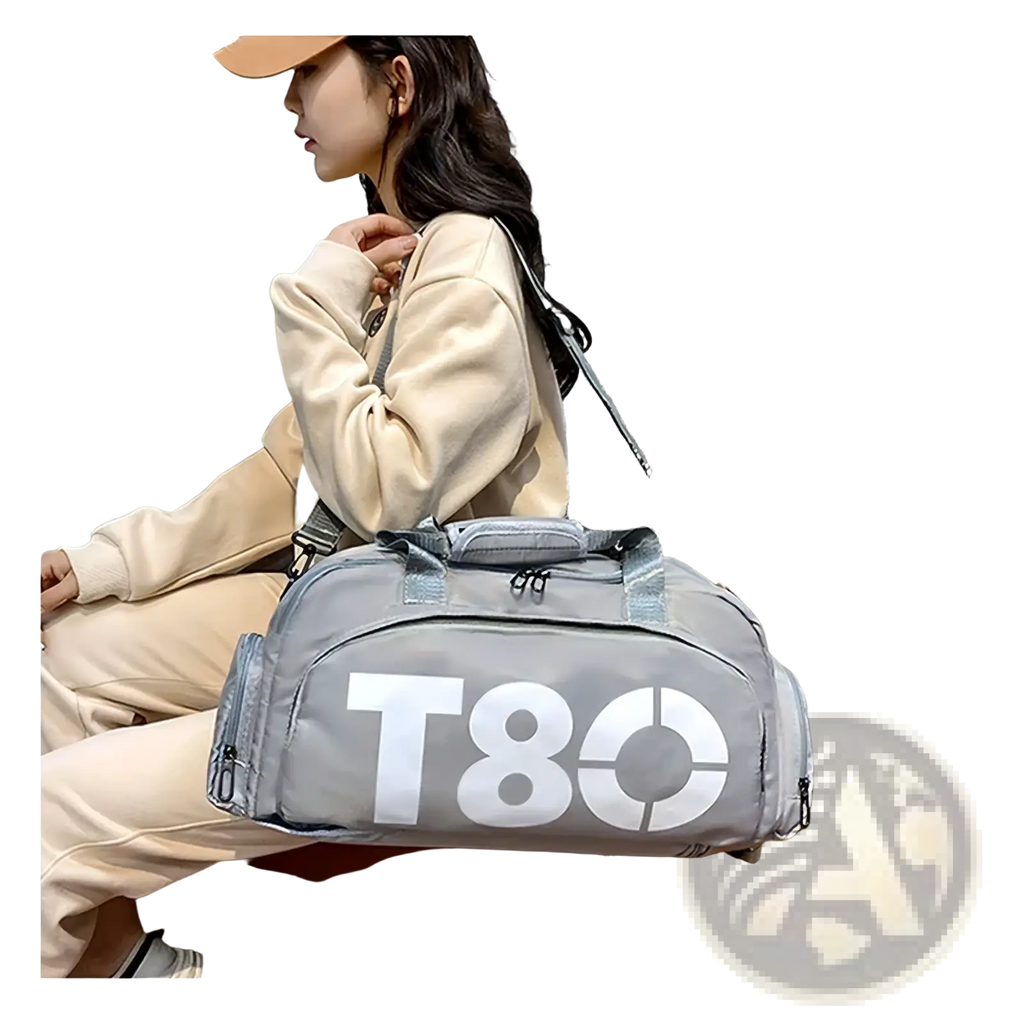 Gray t80 gym duffel bag with reinforced handles white lettering and shoe compartment for organized storage