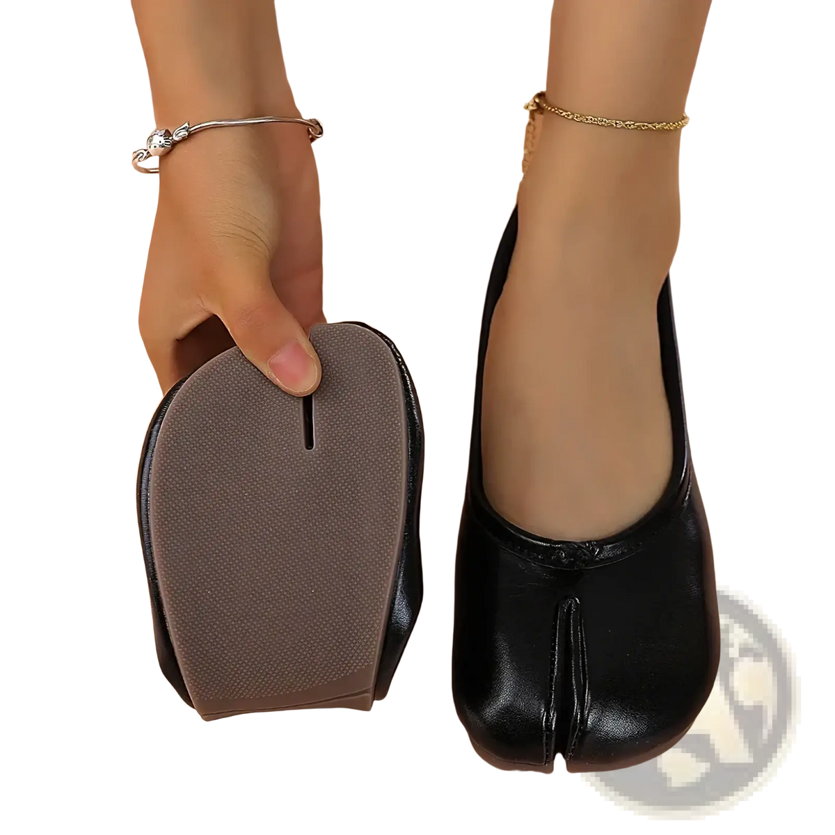 Black leather tabi leather flat shoes featuring a removable gray foam insole for enhanced comfort
