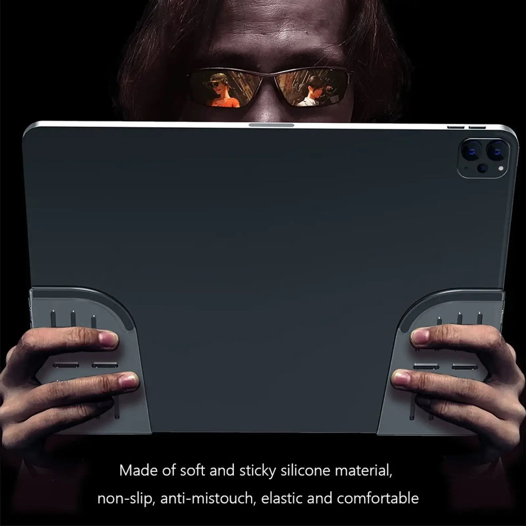 Dark gray silicone tablet gaming grip pads with textured non-slip surfaces for secure mobile controller handling