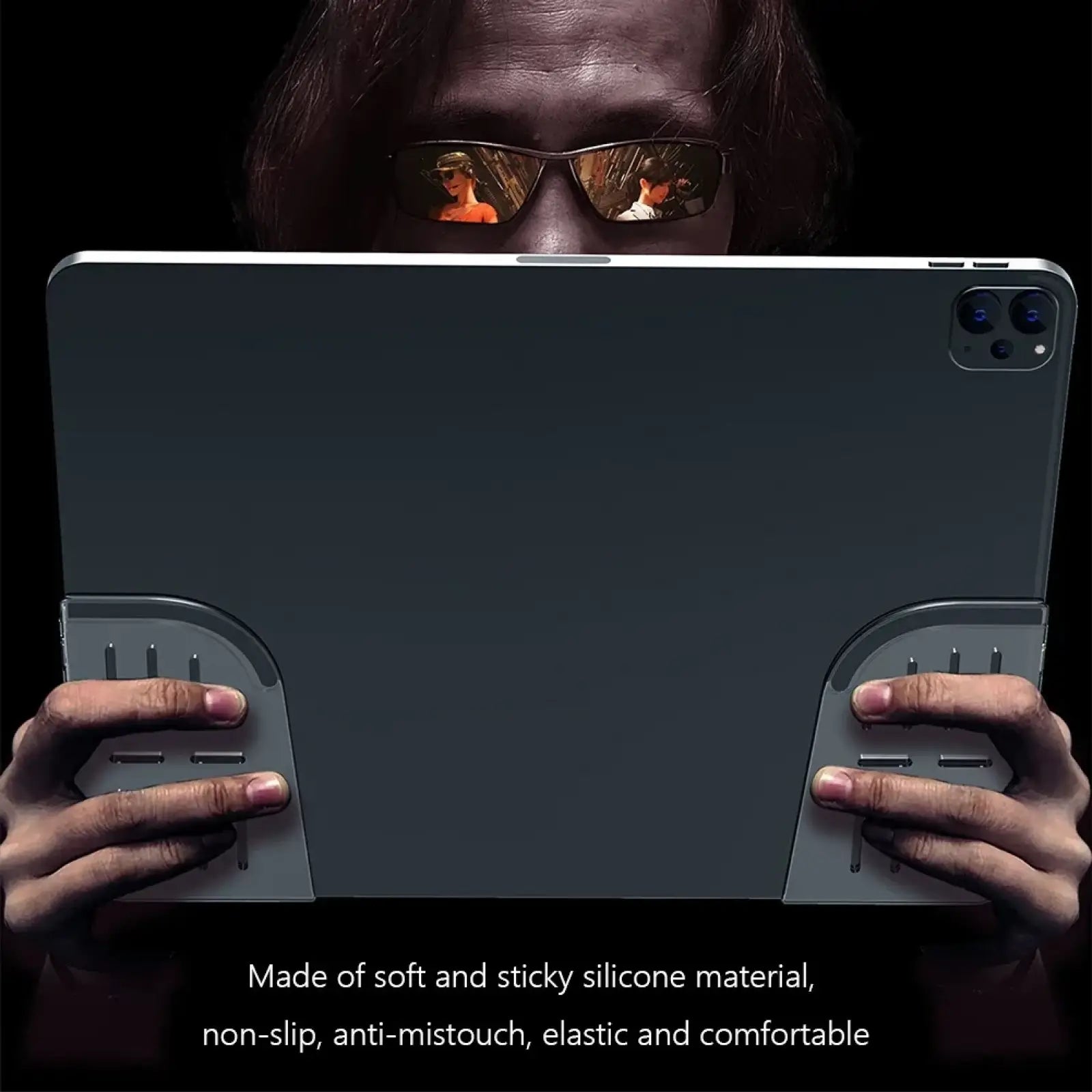 Dark gray silicone tablet gaming grip pads with textured non-slip surfaces for secure mobile controller handling