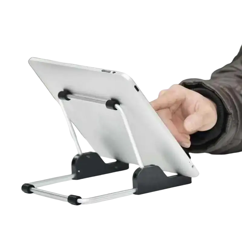Silver and black foldable aluminum universal tablet holder stand holding a white iPad in adjustable position
