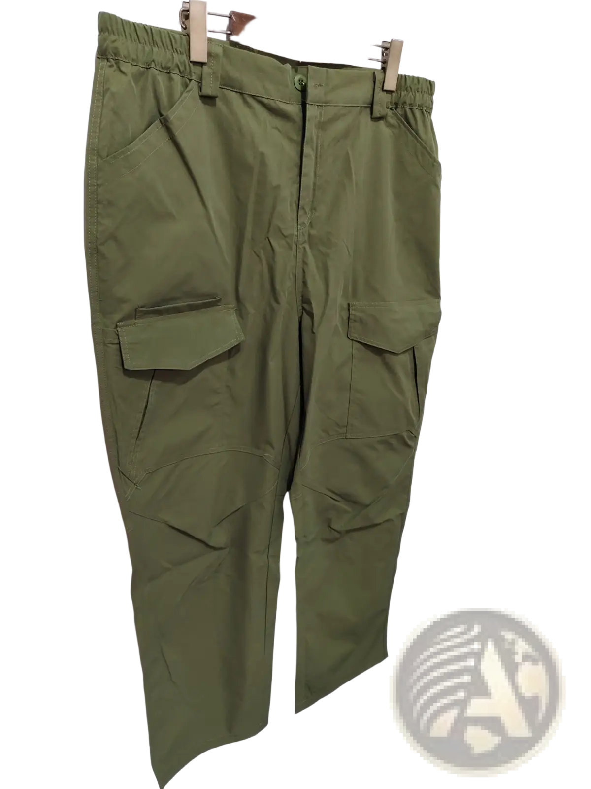 Olive green tactical cargo pants with multiple pockets and elastic waistband designed as waterproof work trousers