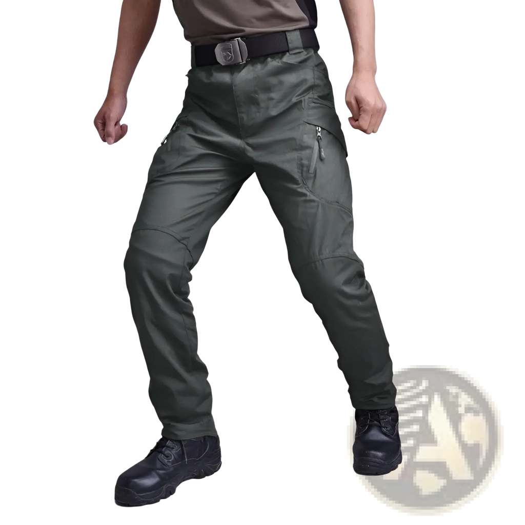 Dark olive green tactical military combat pants for men with multiple zippered pockets and reinforced knee areas